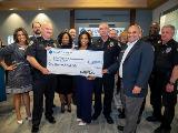 Sharonview delivers check to Simpsonville Victim Services