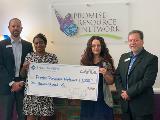 Sharonview delivers check to the Promise Resource Network