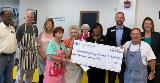 Sharonview delivers check to Spartanburg Soup Kitchen